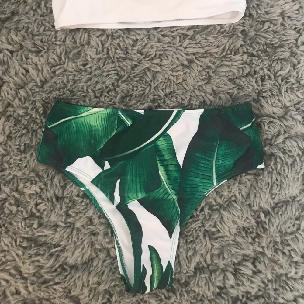 High waisted swim bottoms and black top